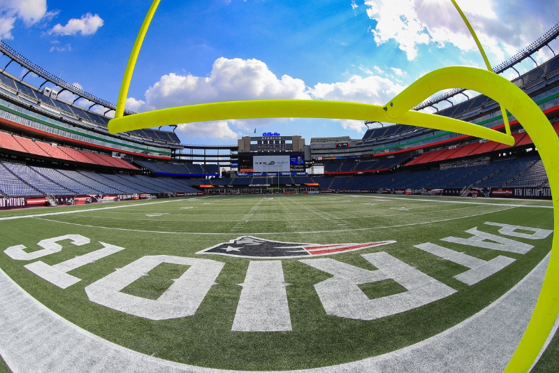 The New England Patriots logo is displayed on the Gillette Stadium field.