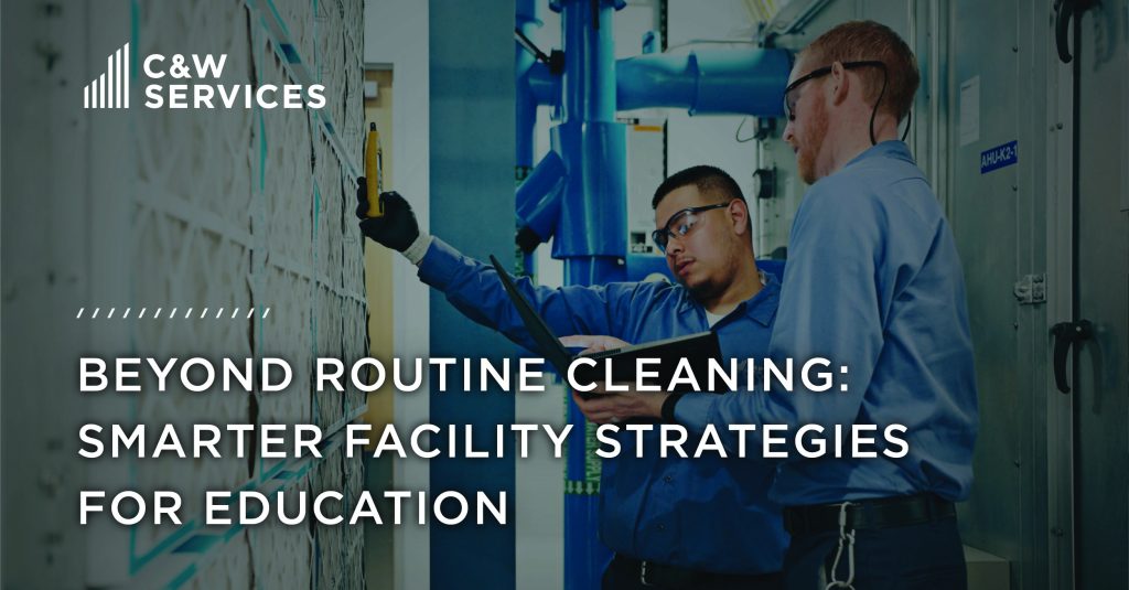 Two facility workers in blue shirts inspect and clean an air filter in an industrial setting alongside text promoting smarter facility strategies for education.