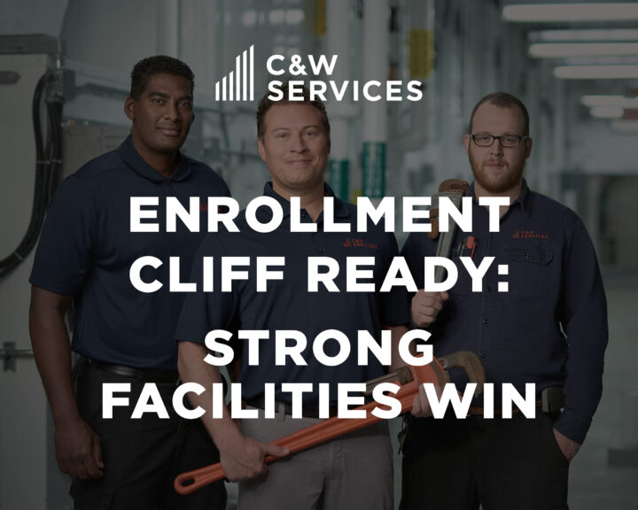 Three men in work uniforms stand in an industrial facility holding tools. Text reads: 