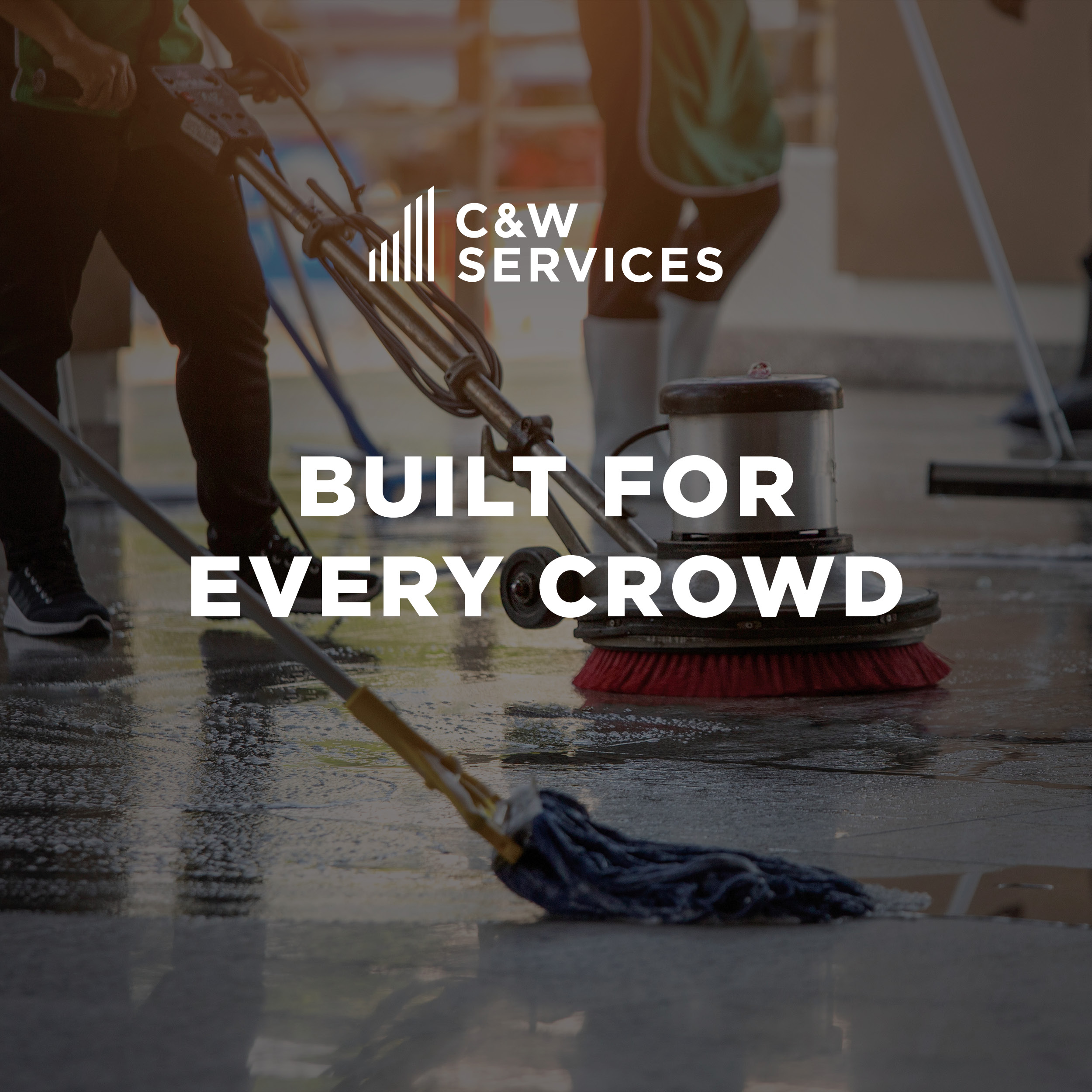 Close-up of cleaning equipment in use on a shiny floor, with the text “C&W Services Built For Every Crowd” overlaid.